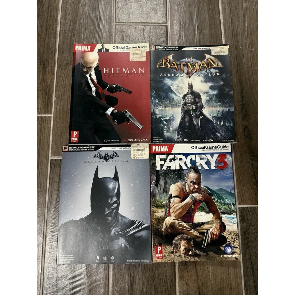 Lot of 4 Official Video Game Guides Brady/Prima Batman, Hitman, Far Cry